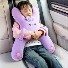 Child sleeping with NapBuddy purple bunny travel pillow
