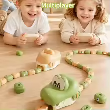 Two kids playing SnapBite magnetic snake game together